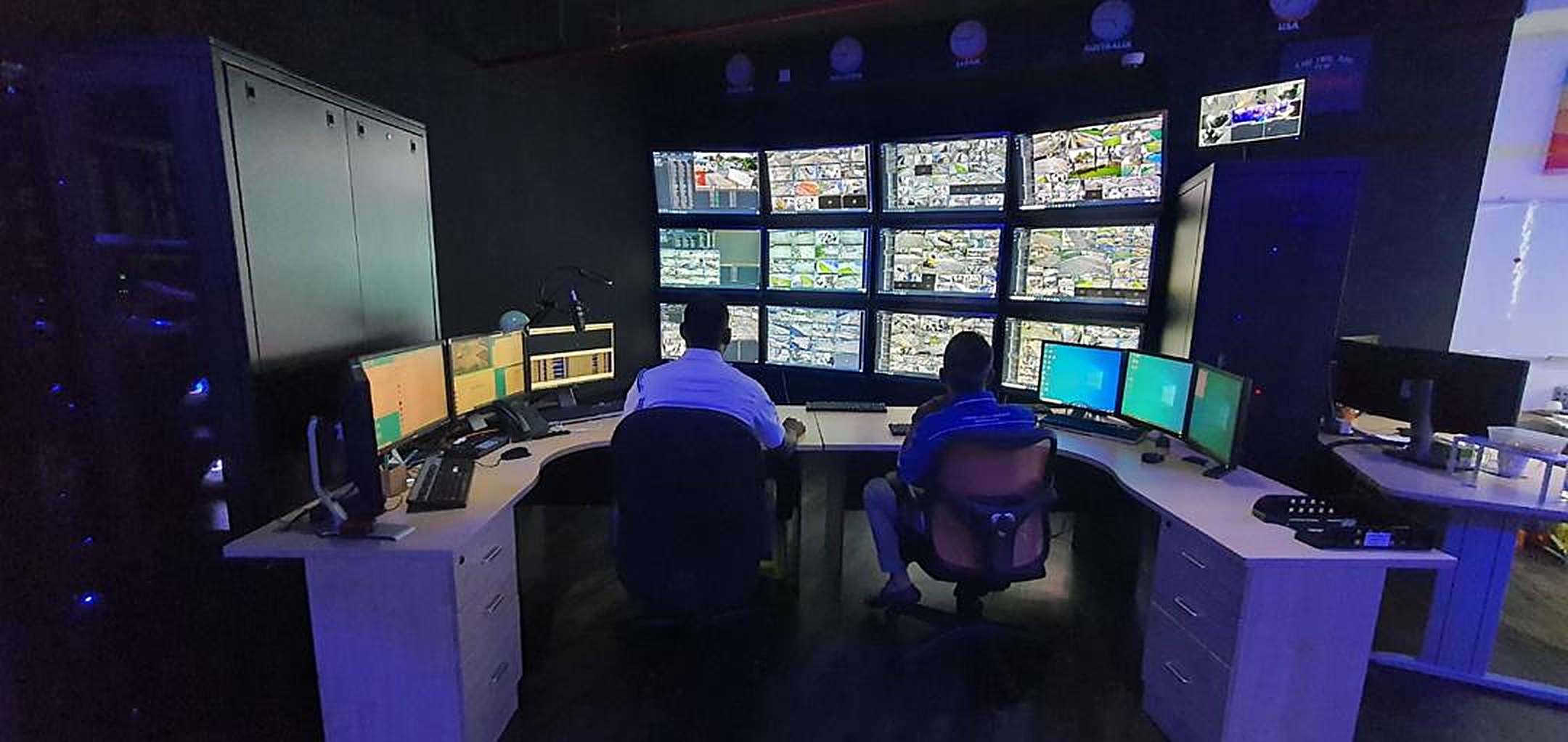 QC Command Centre operators at the video wall